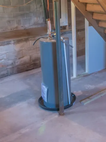 A photo of a leaking water heater